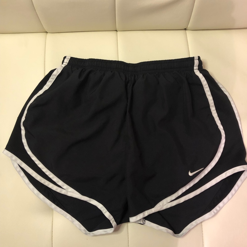 Nike women black shorts size small with built in underwear and draw string waist